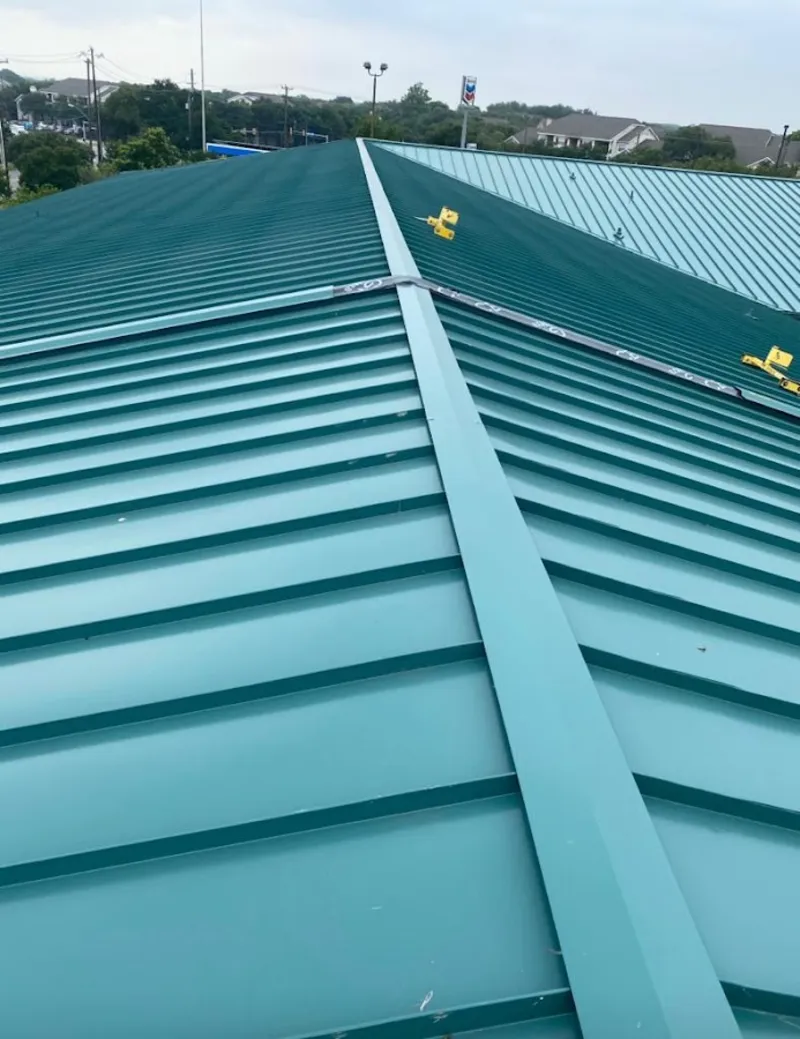 Green commercial metal roof ridge and valley for Metal Roof Repair in Hewitt